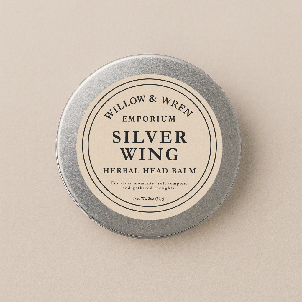 Tin of Willow & Wren Emporium Silver Wing Herbal Head Balm on a beige background